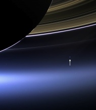 This is what Earth looks like from 1.5 billion kilometers away; the Cassini spacecraft spots a pale blue dot beneath Saturn's rings.