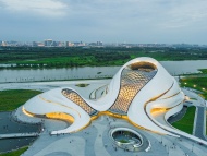哈尔滨大剧院坐落于中国黑龙江省哈尔滨市松北区的文化中心岛内，包括大剧院、小剧场， 建筑采用了异型双曲面的外型设计，是哈尔滨的标志性建筑。