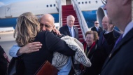 U.S. contractor Alan Gross is welcomed with a hug after he arrived at an Air Force base in Maryland on Wednesday, December 17. Gross, held in Cuban custody since 2009, was freed as part of a landmark deal with Cuba that paves the way for a major overhaul in U.S. policy toward the island. &quot;It's time for a new approach,&quot; said President Barack Obama, who said he's instructed Secretary of State John Kerry to begin discussions with Cuba to re-establish diplomatic relations.