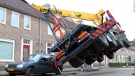 A crane fell on the roof of a house in Ijesselstein, Netherlands, on Saturday, December 13. No one was hurt in the incident, which happened when a man tried to surprise his girlfriend by proposing from the top of the crane, according to Dutch affiliate RTL News.